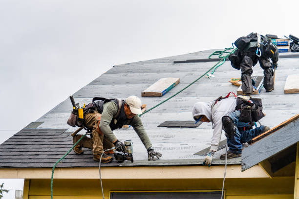 Professional Gutter Installation technician working in Clarksburg, CA